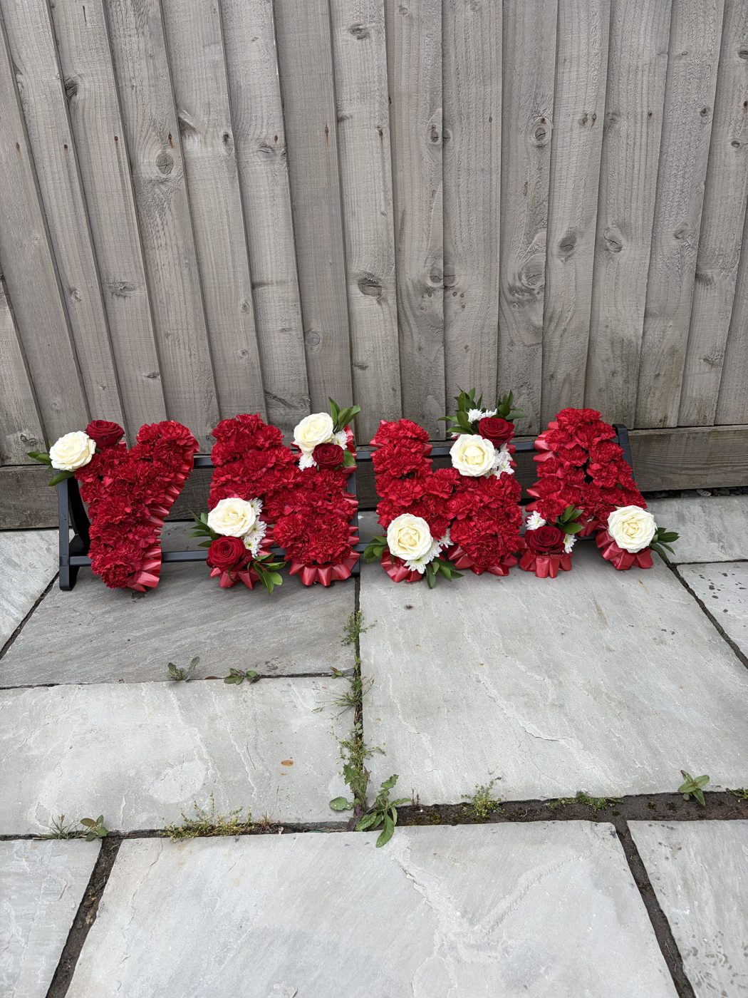 YNWA red and white lettering tribute